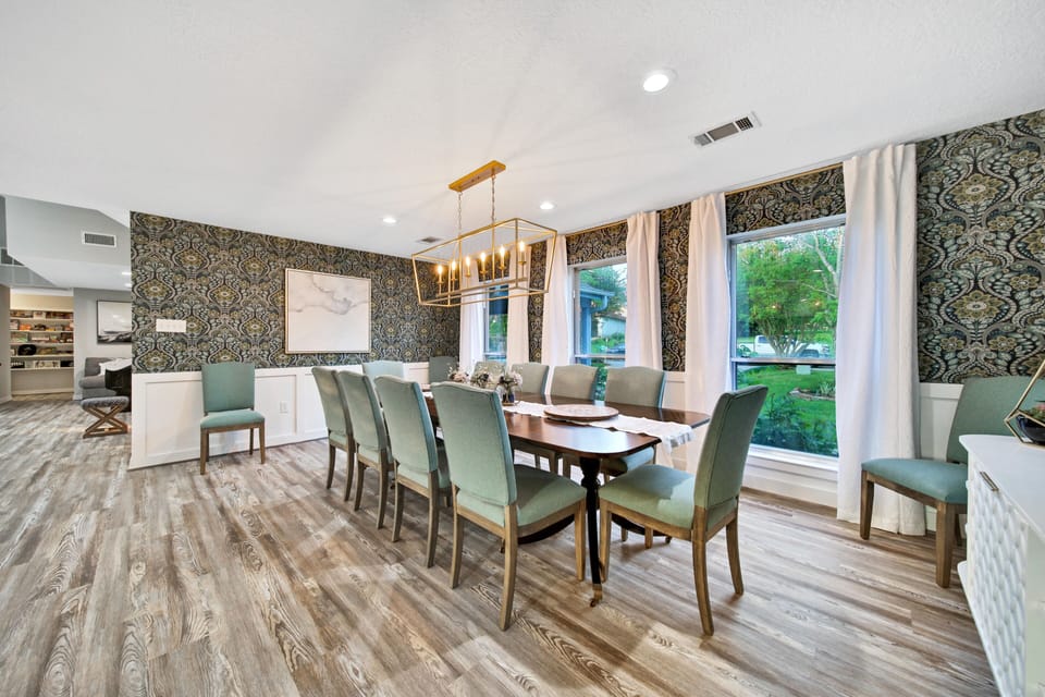 Shot from living room showing more of design and view through front windows. 