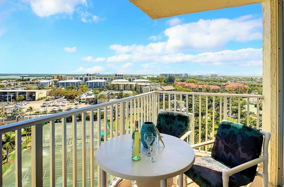 Balcony with partial beach view and bay view