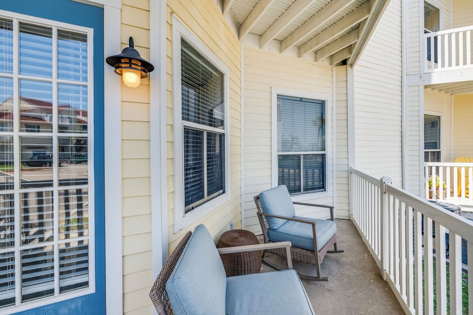 Settle into your private balcony with comfy chairs and a side table, perfect for morning coffee or evening relaxation.