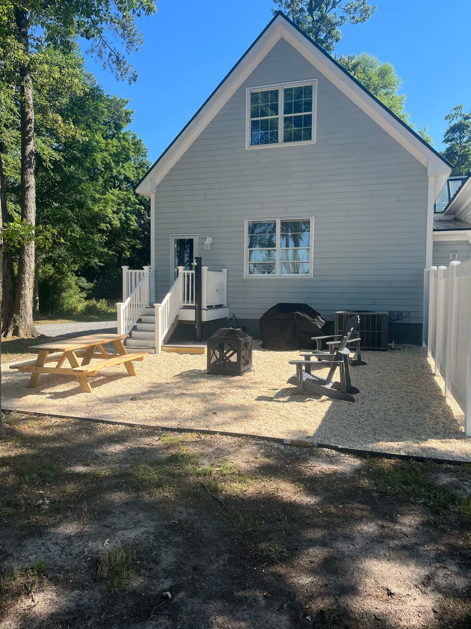 Private outdoor area with grill, fire pit, outdoor shower—steps to beach!