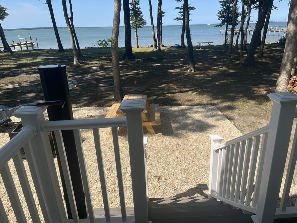 Outside the door private area with yard that leads to beach!