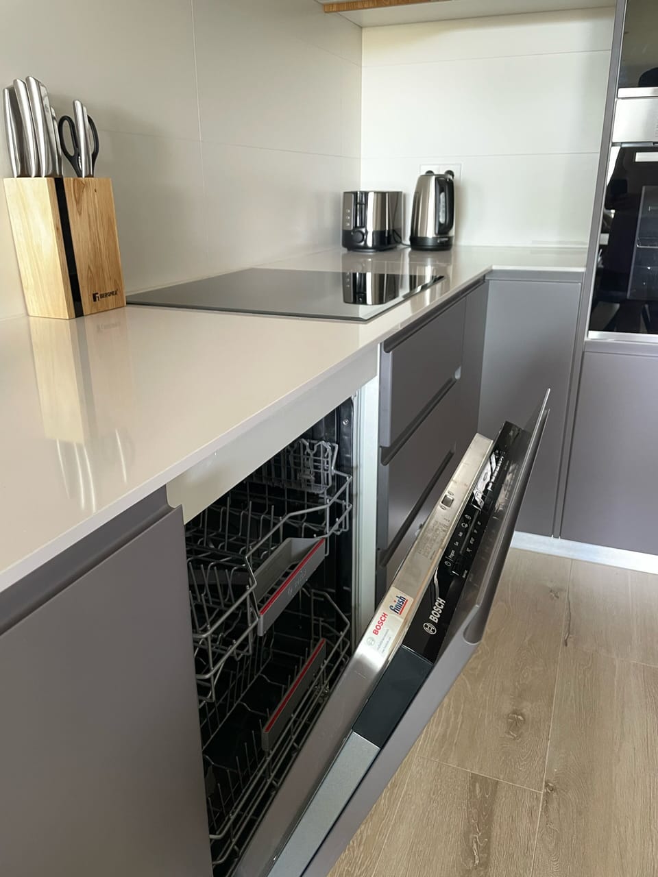 Kitchen with built in dishwasher and induction hob 
