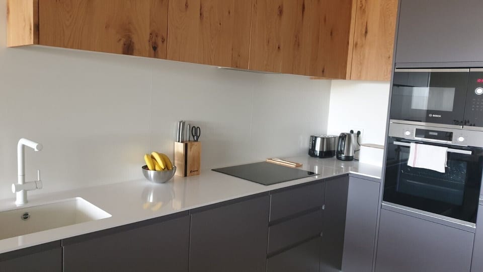 Kitchen with microwave and oven 
