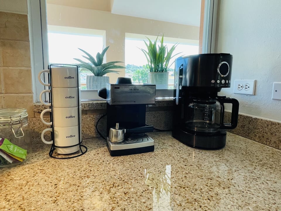 Coffee and espresso maker. Coffee, tea, sugar and creamer provided.
