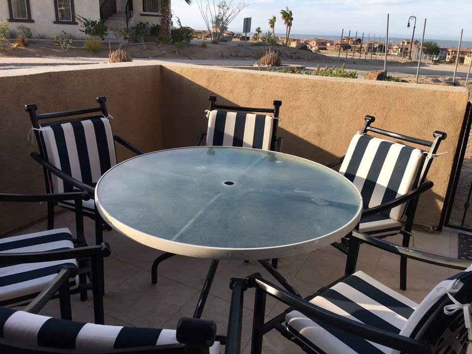 Downstairs patio with beach view