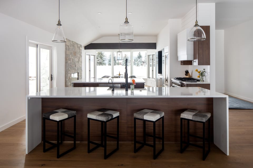 Open kitchen, entry and deck access with Sleeping Indian and Teton views