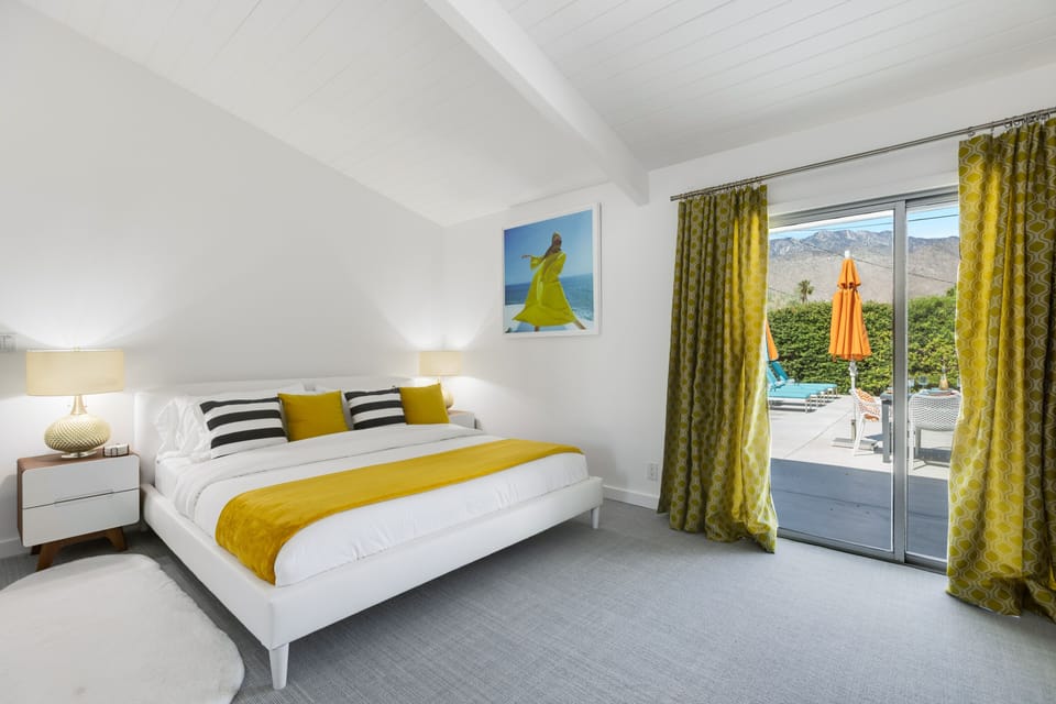 Master bedroom w a king bed, Roku TV, en-suite bathroom, & direct yard access