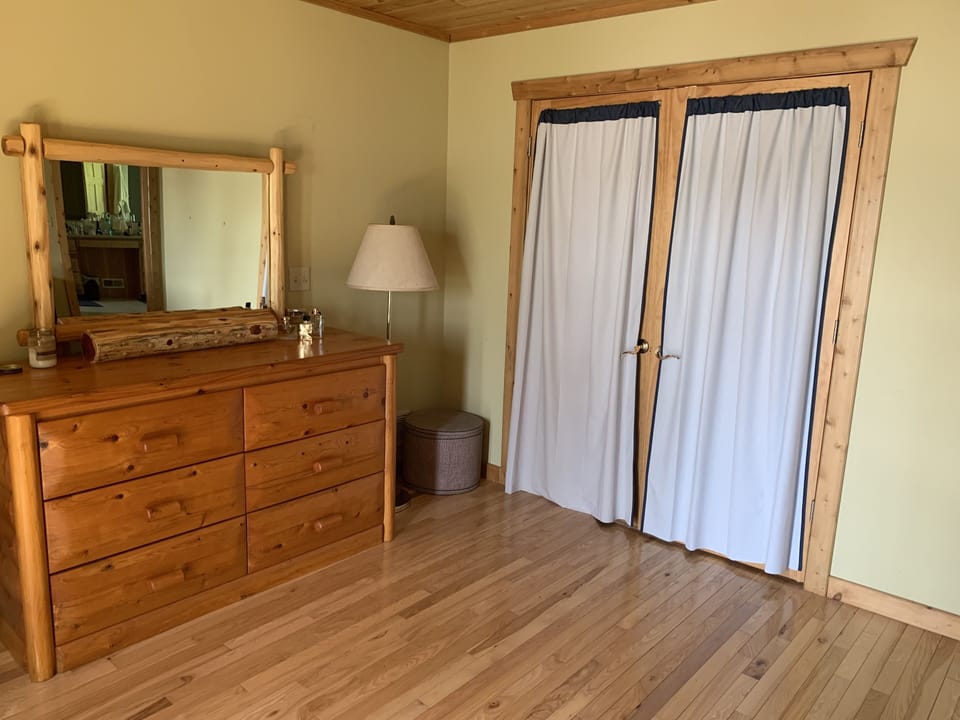 Master bedroom entrance and dresser