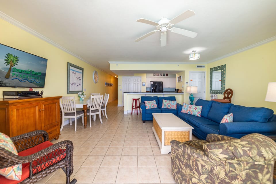 The living room offers a queen sized sofa sleeper with matching loveseat and two accent chairs