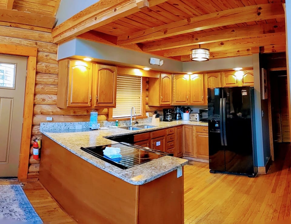 Fully stocked kitchen with granite countertops!