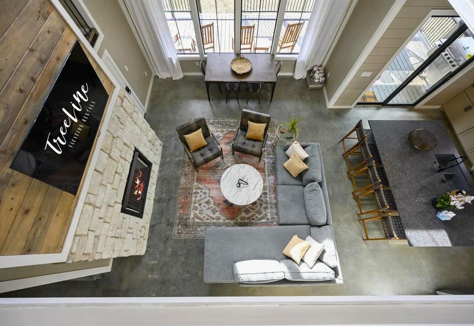 Soak in the airy ambiance of this loft-style living space, where every angle is a visual treat.