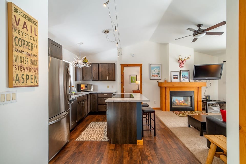 The home features an open concept kitchen and living room space