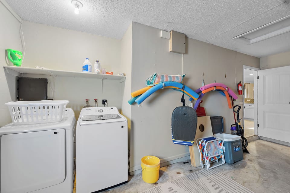 The laundry in the garage is equipped with a washer and dryer, as well as laundry detergent to make this place feel like home!