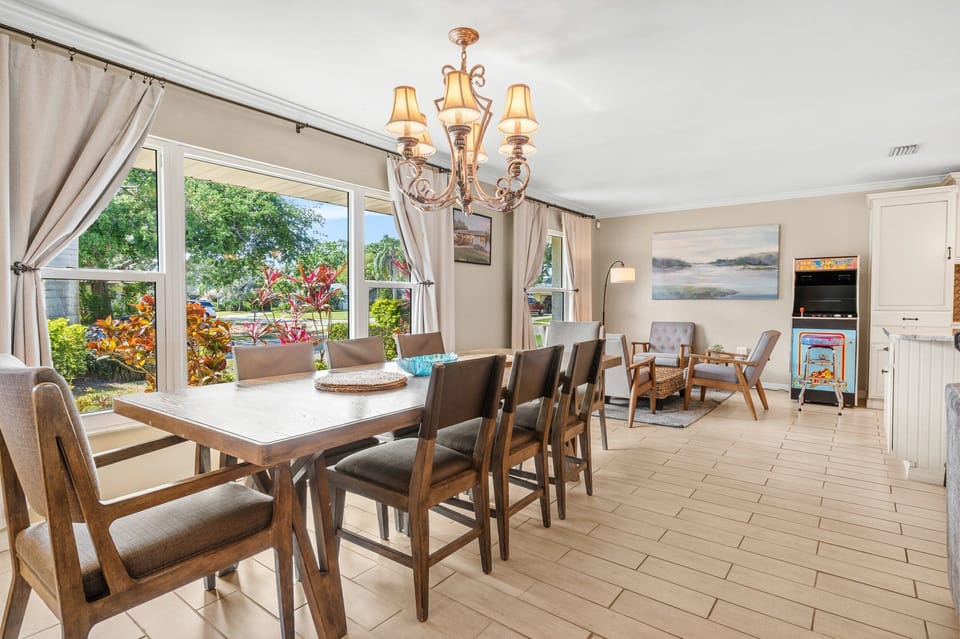Large 8 person dining table with beautiful dish-wear available for guest use.