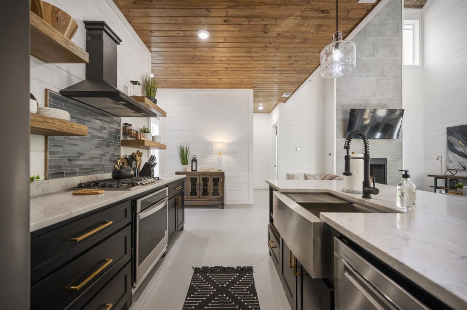 Kitchen: Modern elegance awaits you with sleek finishes and abundant natural light!