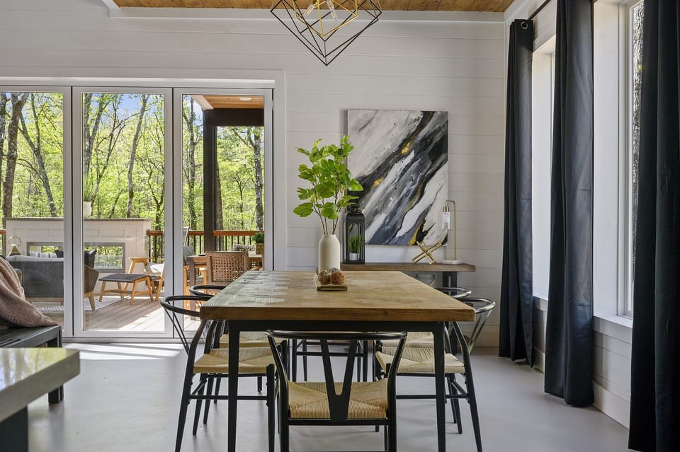 Dining Room: Delight in meals with nature views and modern decor! Perfect for gatherings!