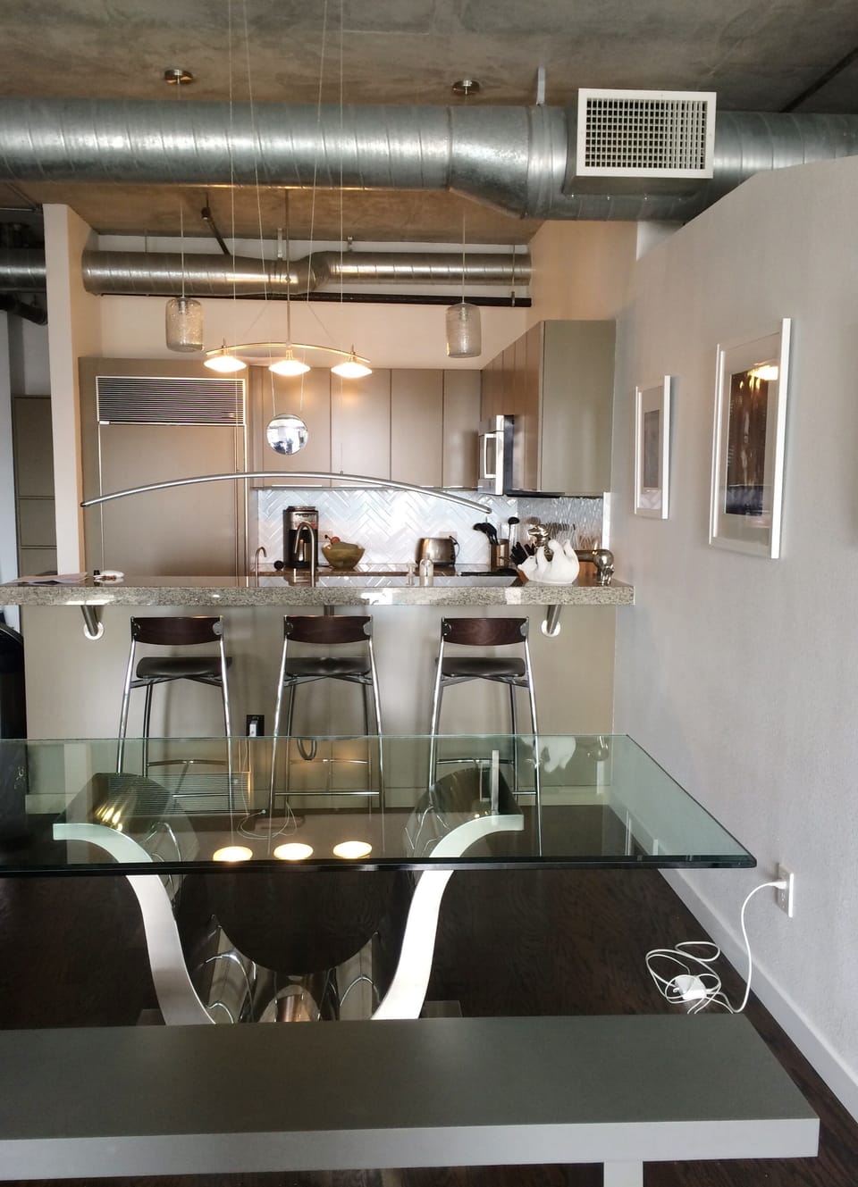 Dinning table, looking back to bar counter and kitchen