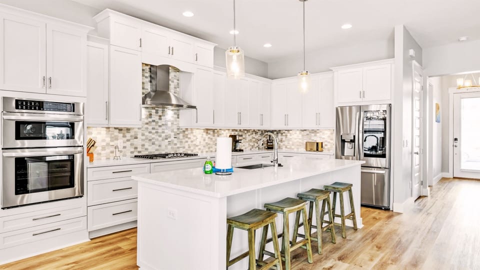 On your right, you'll find a fully-equipped chef's kitchen where you can cook in.