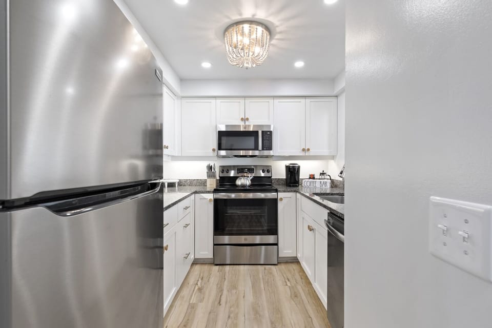 Kitchen with all of the small appliances you need to cook 
