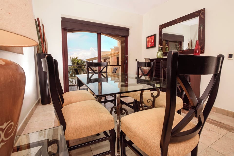 Share delicious meals or a lively game of cards at our comfortable dining setup!
