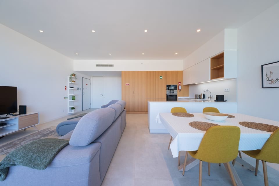 Overview of living room and dining room with Kitchen