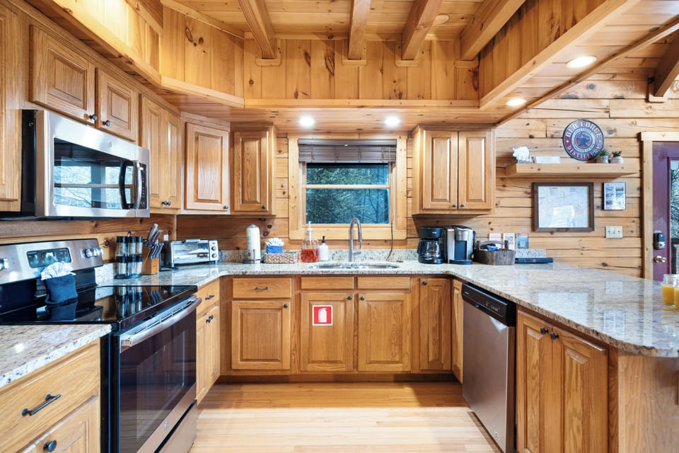 Well stocked kitchen & bar area that fits comfortably 4 people.