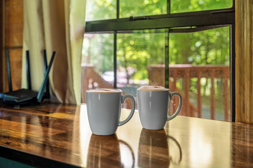 Start your day with coffee, forest views, and total peace—perfect for slow mornings before hitting nearby trails or local shops.