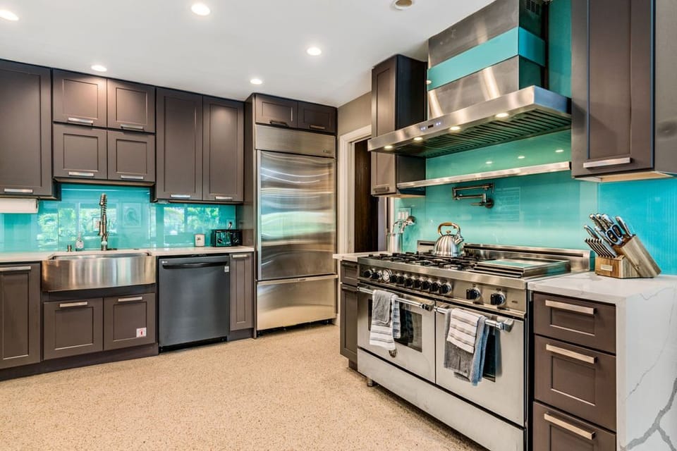 Professional 6 burner gas stove with flat cook-top & subzero refrigerator