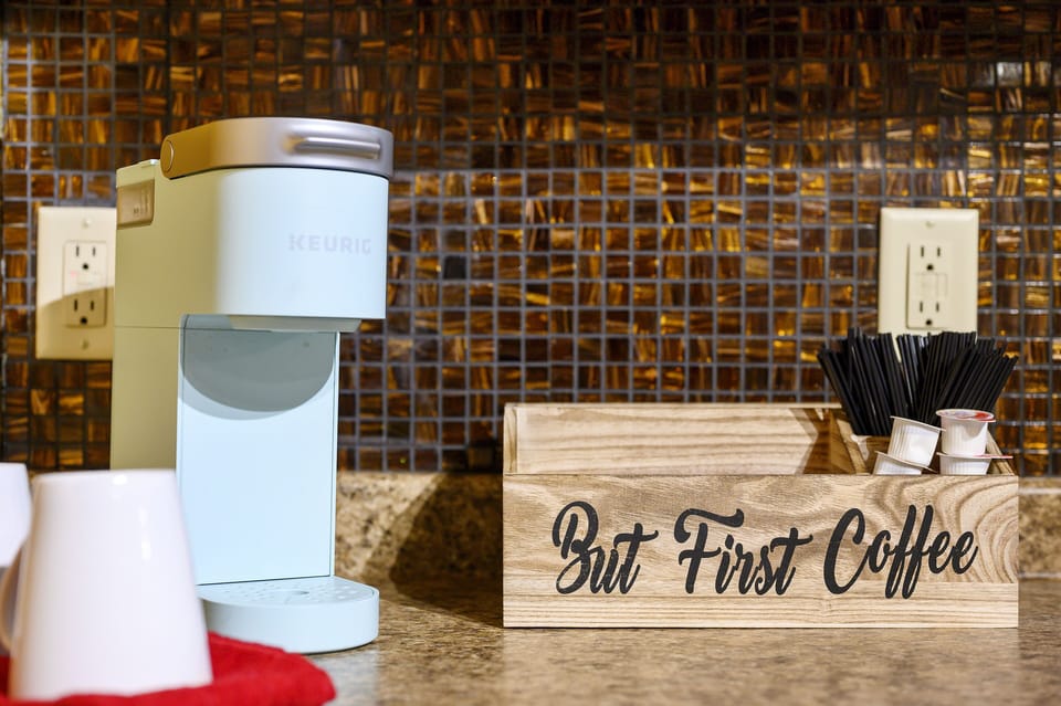 Keurig brewer with starter kit of pods, creamer and sugar included. 
