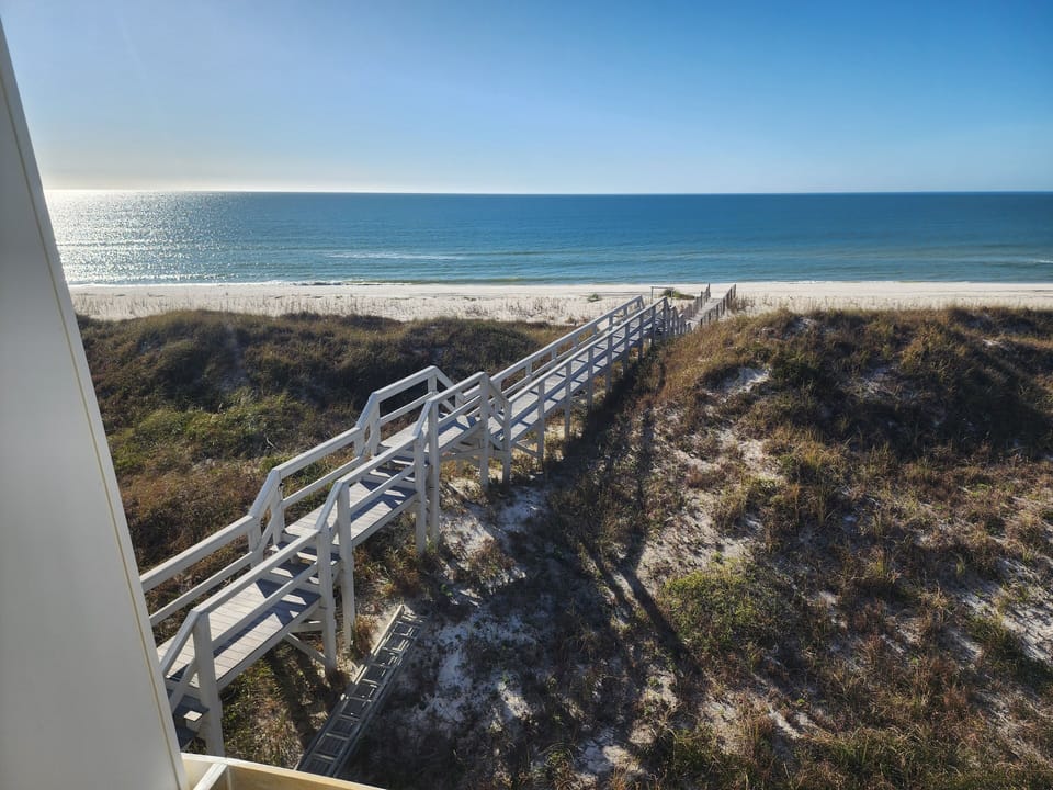 Convenient beach walkover next to our home