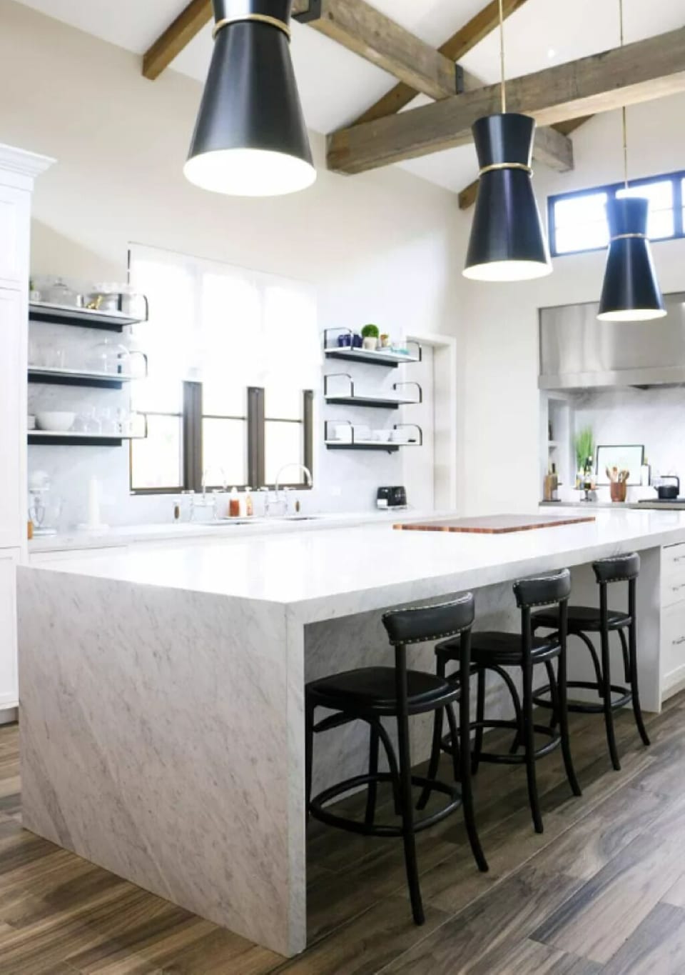 A Stylish overheard chandelier completes the elegant look of the spaces.