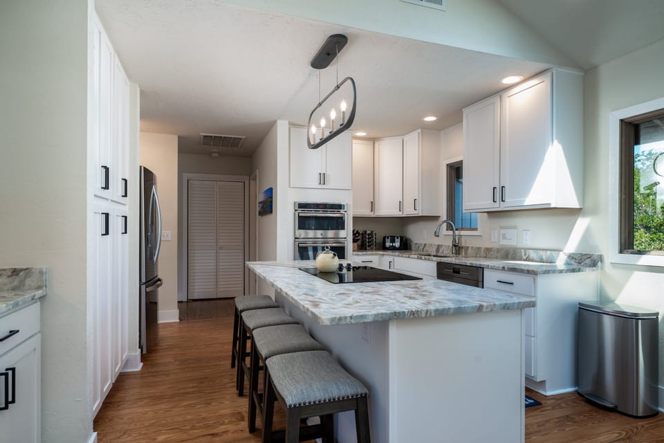 The island has four stools.  Great spot for lunch or meal prepping!