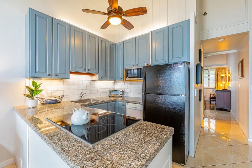Fully equipped kitchen with everything needed for easy island dining.