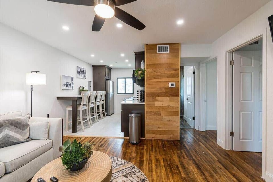 Here, the kitchen opens onto the living room to maximize your sense of expansiveness and flow.