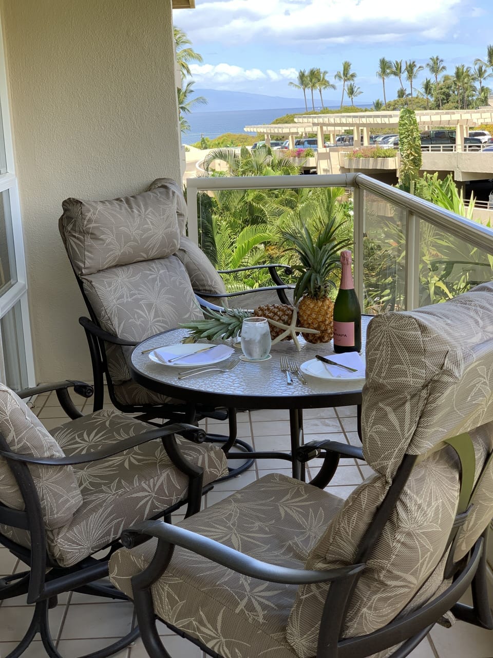 Enjoy tropical palms, manicured lawns, sunsets & open sky on your private lanai!
