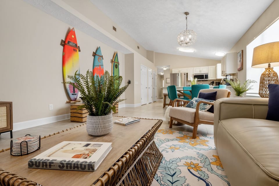 Fun real surf boards line the walls to complete the surf shack beach vibe.