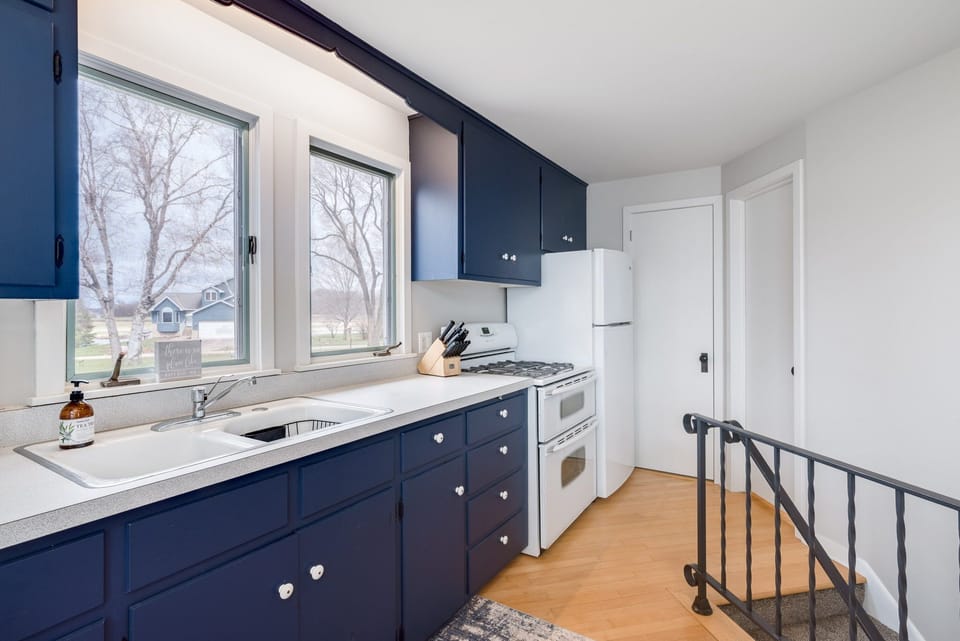 Full size refrigerator and stove and fully stocked kitchen for guests