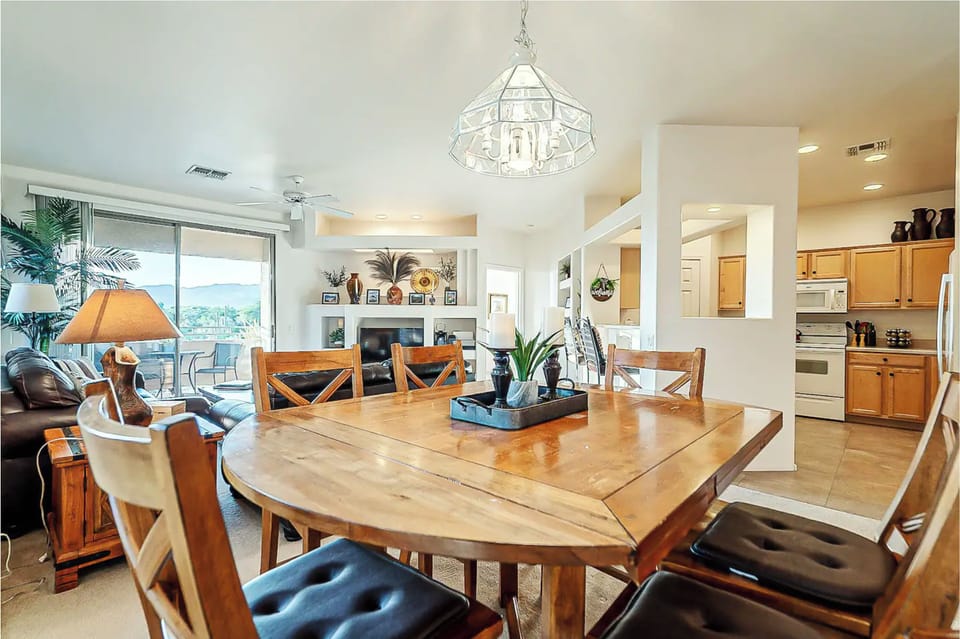Great room w/ dining area and kitchen looking onto the main living space.