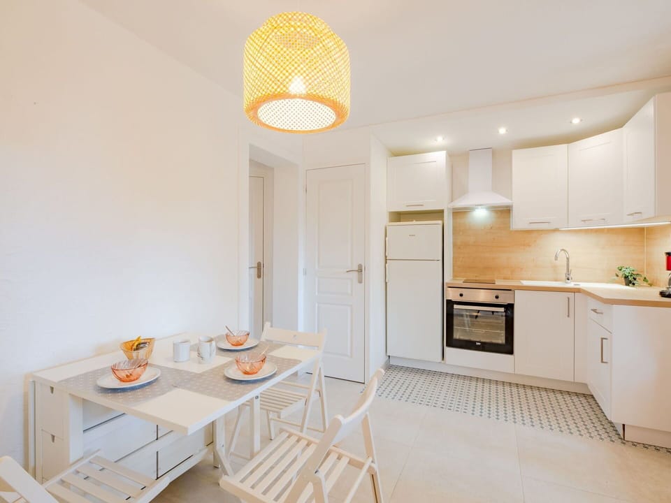 Cabinetry, Furniture, Table, Building, Countertop, Chair, Wood, Lighting, Kitchen Appliance, Interior Design