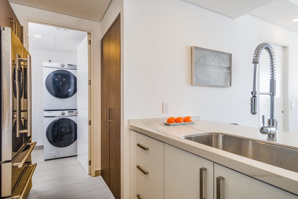 the useful utility room off of the kitchen