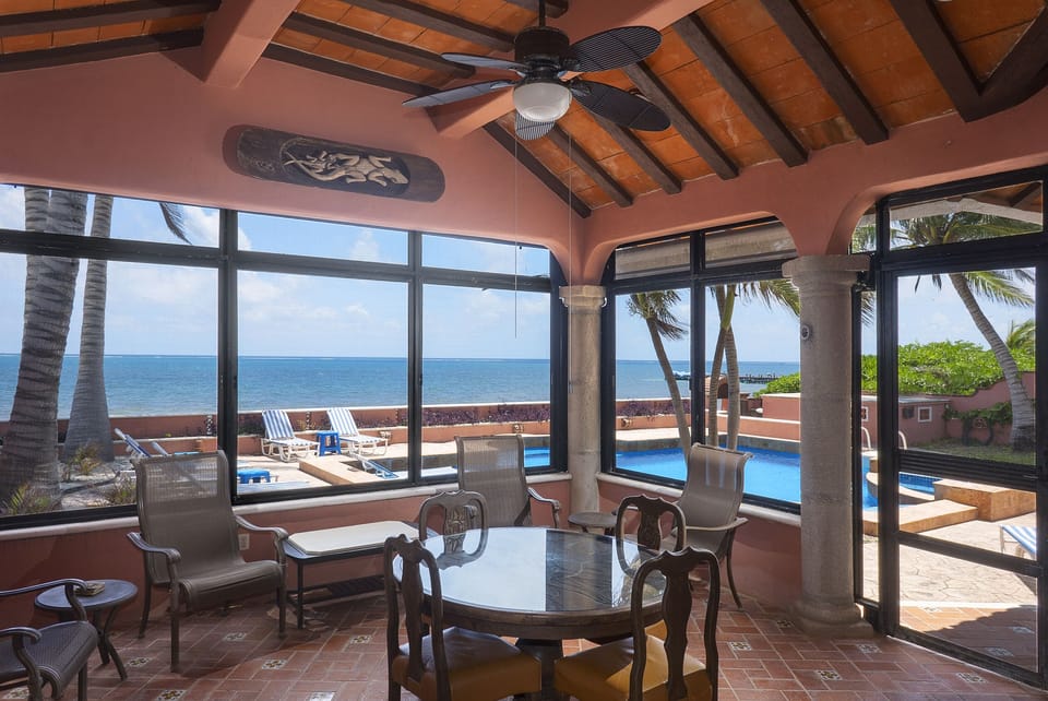Amazing chill out area - Outside, Inclosed and screened Patio Terrace with pool and sea view - BBQ and extra big fridge available here.