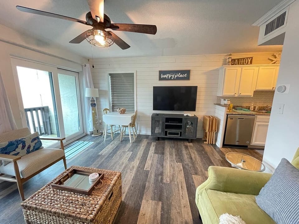 Shiplap entertainment area and small seating area 