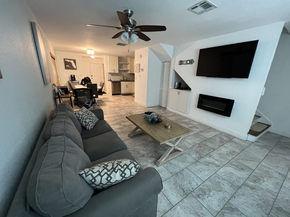 open layout - living room looking towards the kitchen and dining area. 