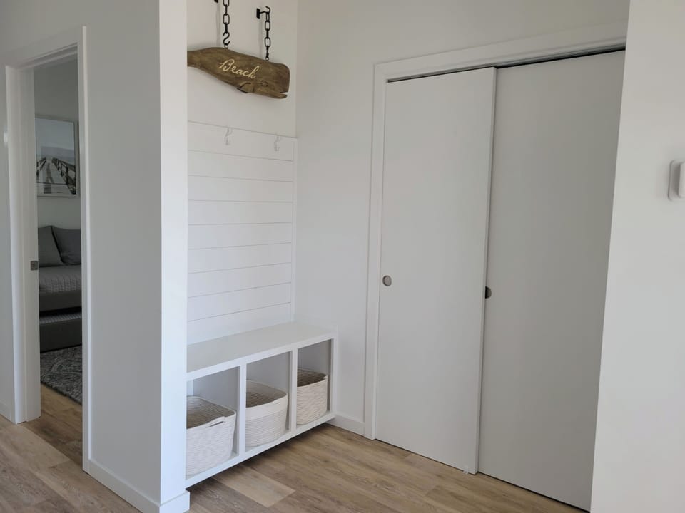 Entry storage area and coat closet