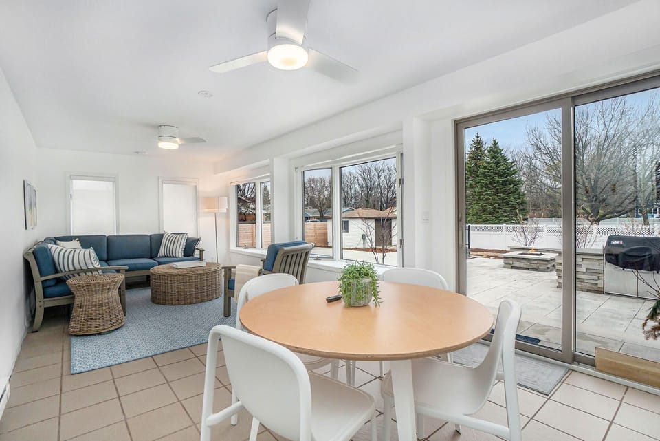 Main Level - Extra 4 Seasons Room w/ Easy Access to Garage and Patio.