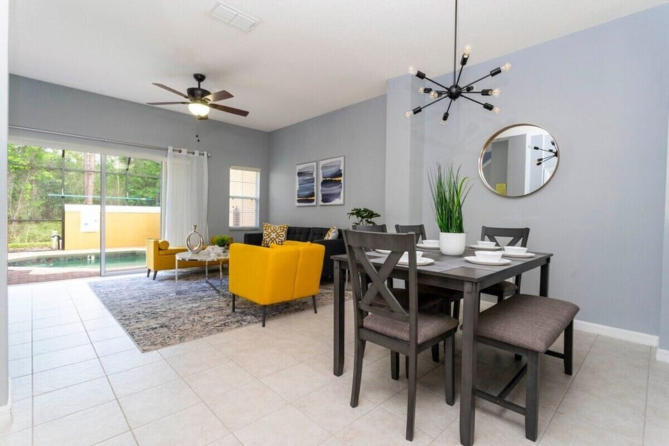Open living space that seamlessly connects the beautiful kitchen and dining area, offering a perfect blend of comfort and style.