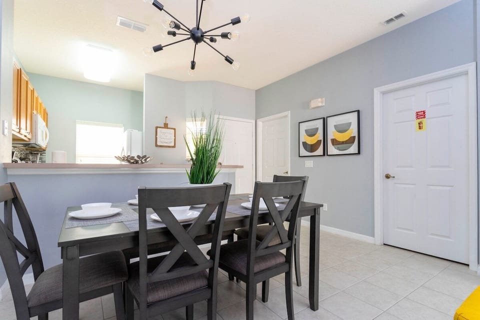 The cozy kitchen is equipped with the essentials for preparing meals for your family  and enjoying a casual dining experience