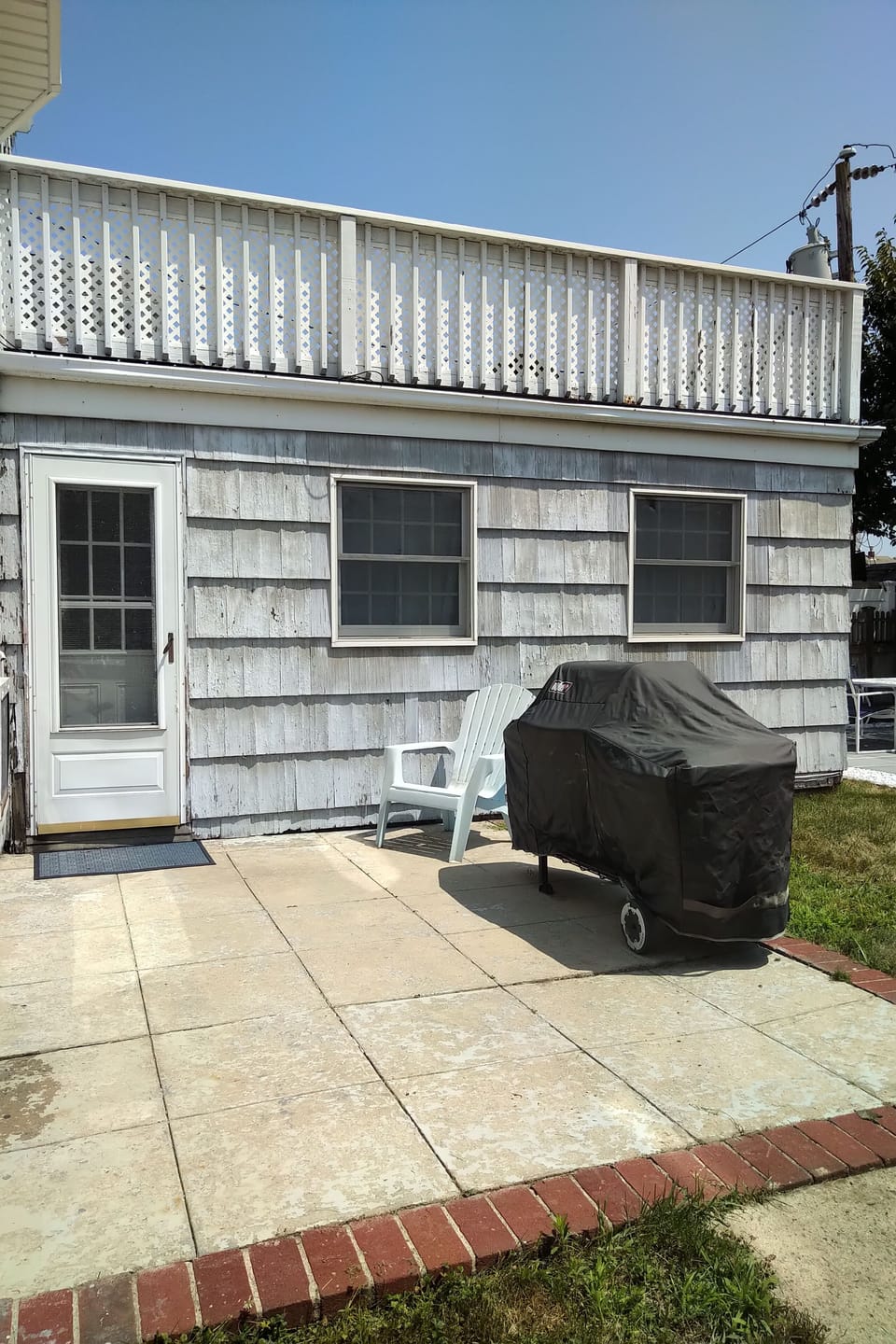 Private entrance.  Patio w/ gas grill.