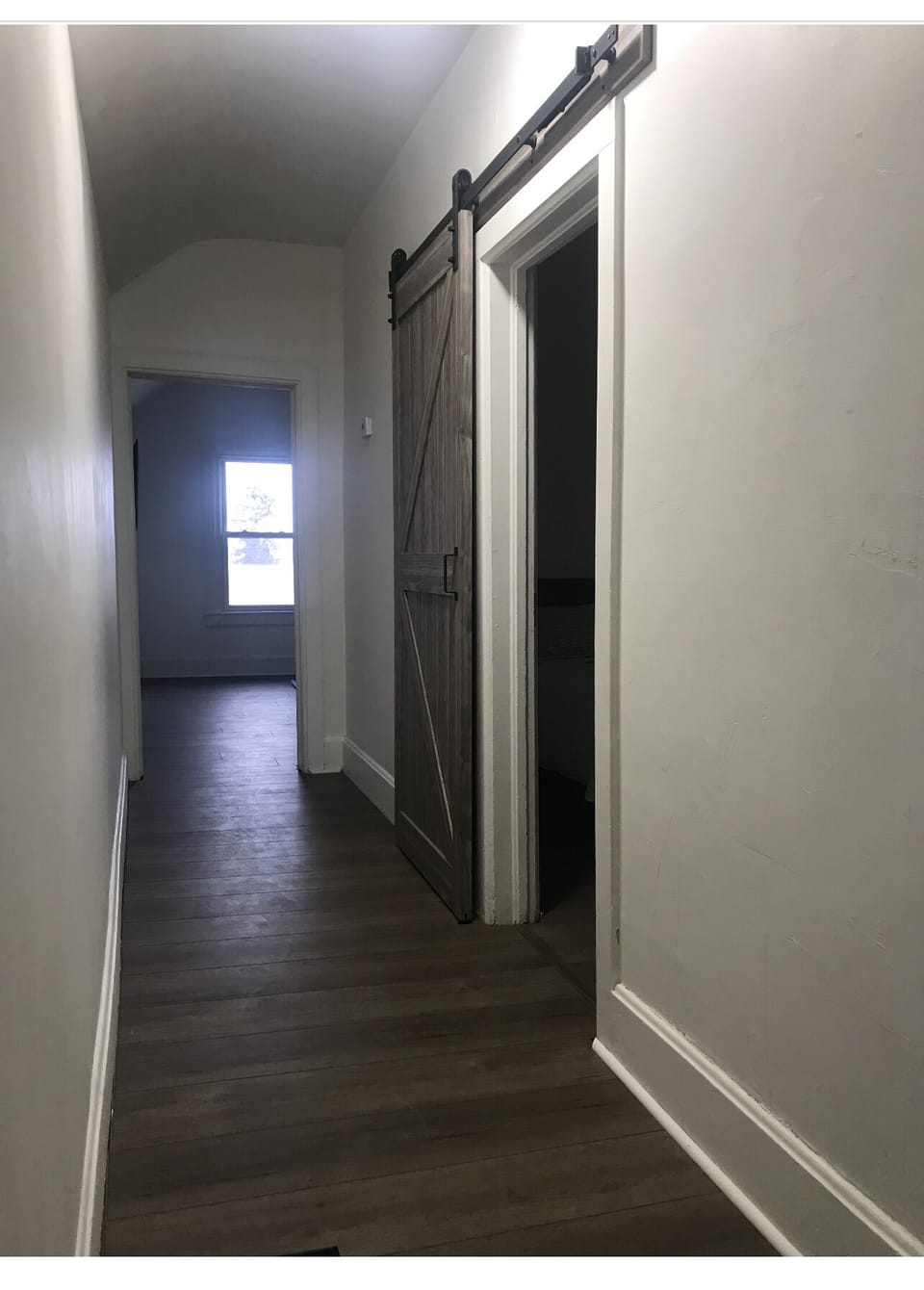 Hallway to bedrooms and living room 