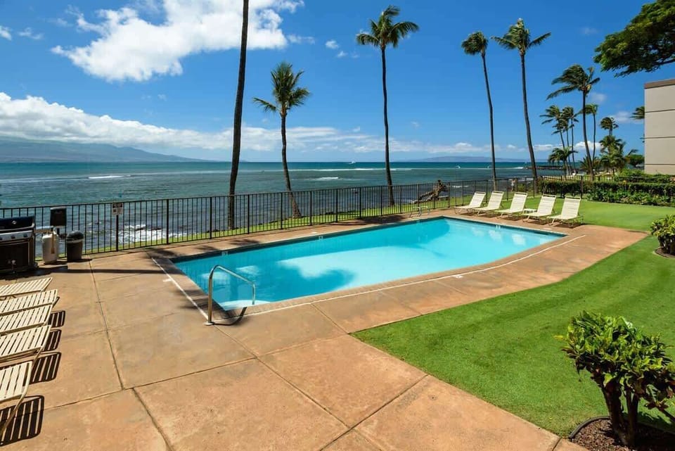 Oceanfront pool and BBQ paradise! Relax by the pool, grill up some delicious food, and enjoy the stunning view.